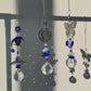 Devil's Eye Crystal Sun Catcher - A Captivating Blend of Light, Shadow, and Rainbow Colors